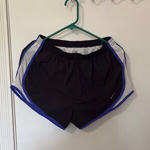 Nike Women's Black and Blue Trim Lined Athletic Shorts